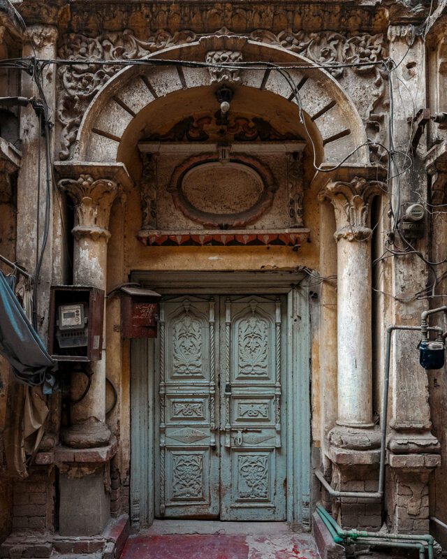 Stucco Arch and Timber Door